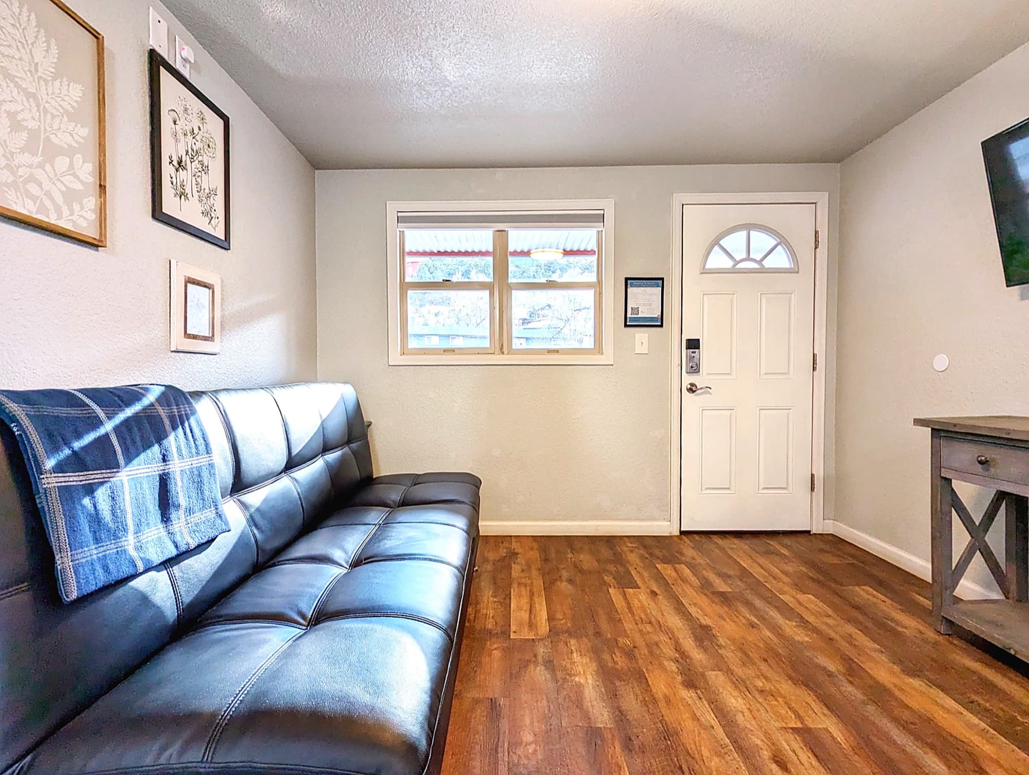 The Suite's living area with garden light